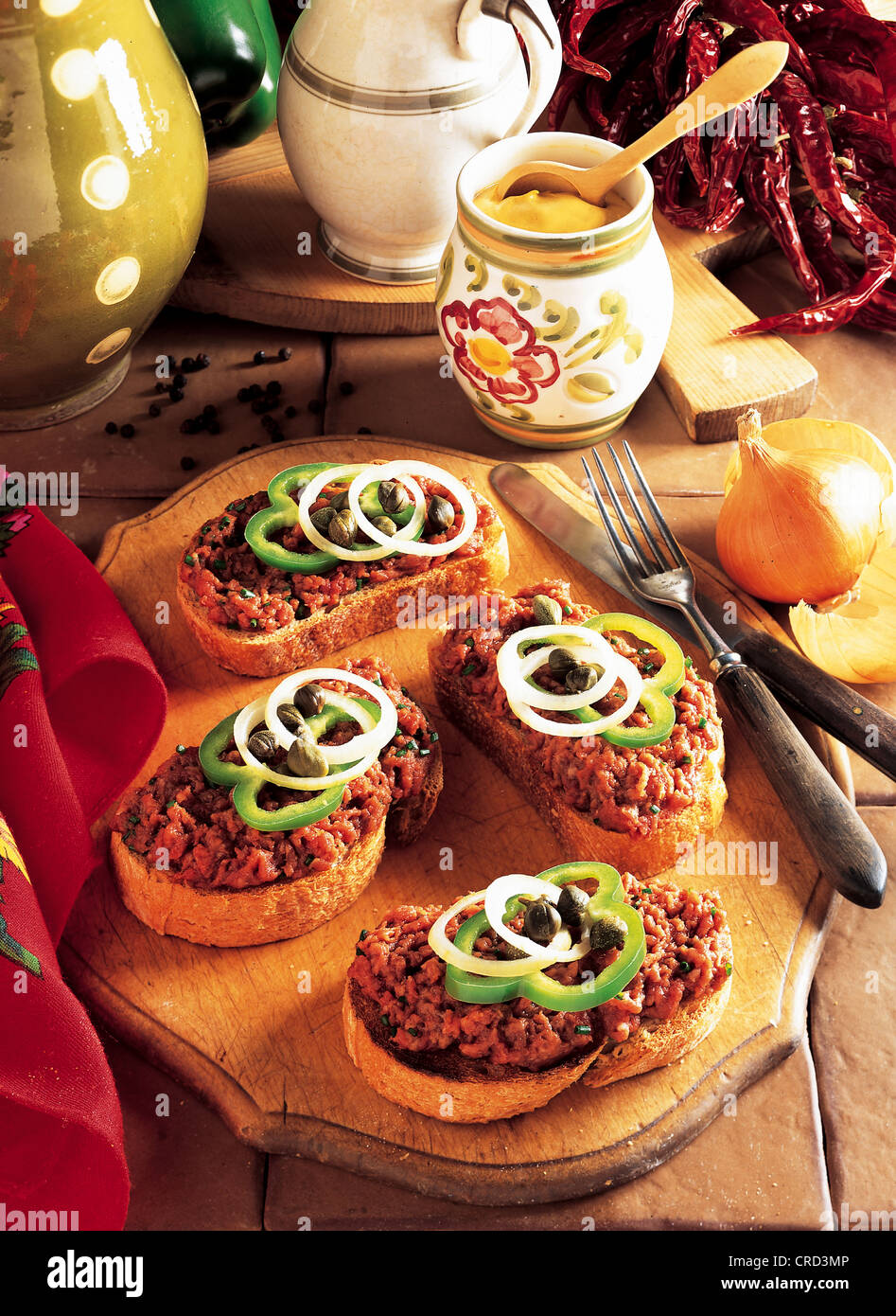 Hungarian steak tartare with bread, minced beef filet, spicy seasoning, served on bread, cold starter, Hungary Stock Photo