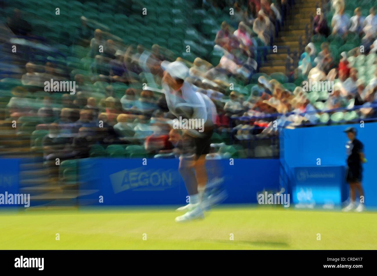 Blur effect image of male tennis player in action at Devonshire Park Eastbourne for the Aegon International Tournament Sussex UK Stock Photo