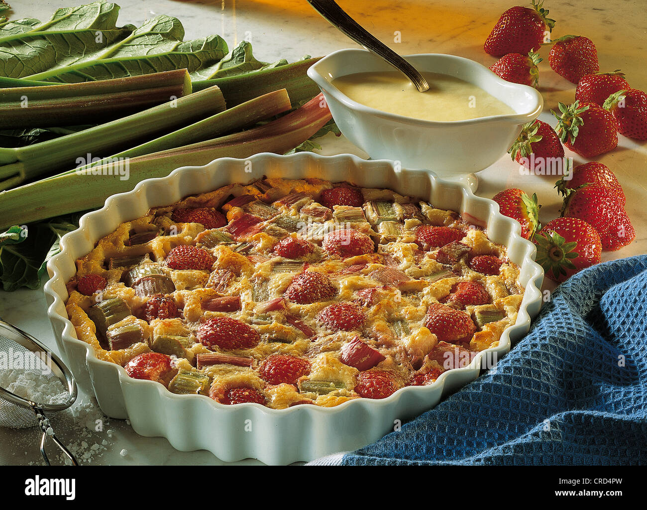 Rhubarb gratin with strawberries, France. Stock Photo