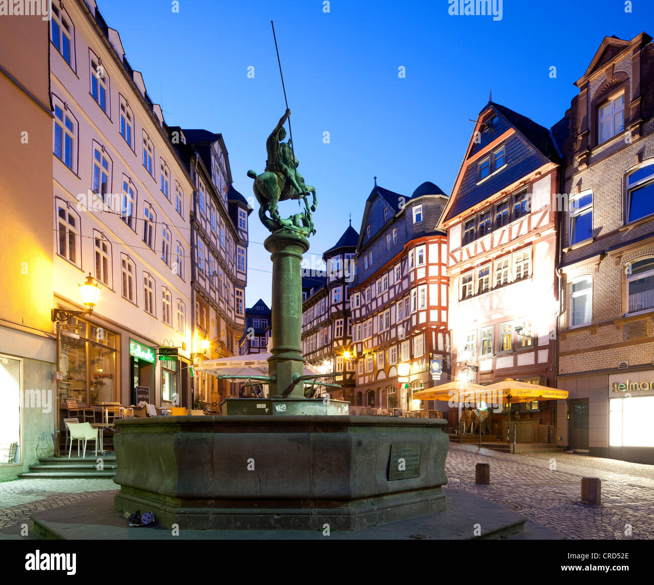 Market well, half-timbered houses in the historic town centre of Marburg, Hesse, Germany, Europe, PublicGround Stock Photo