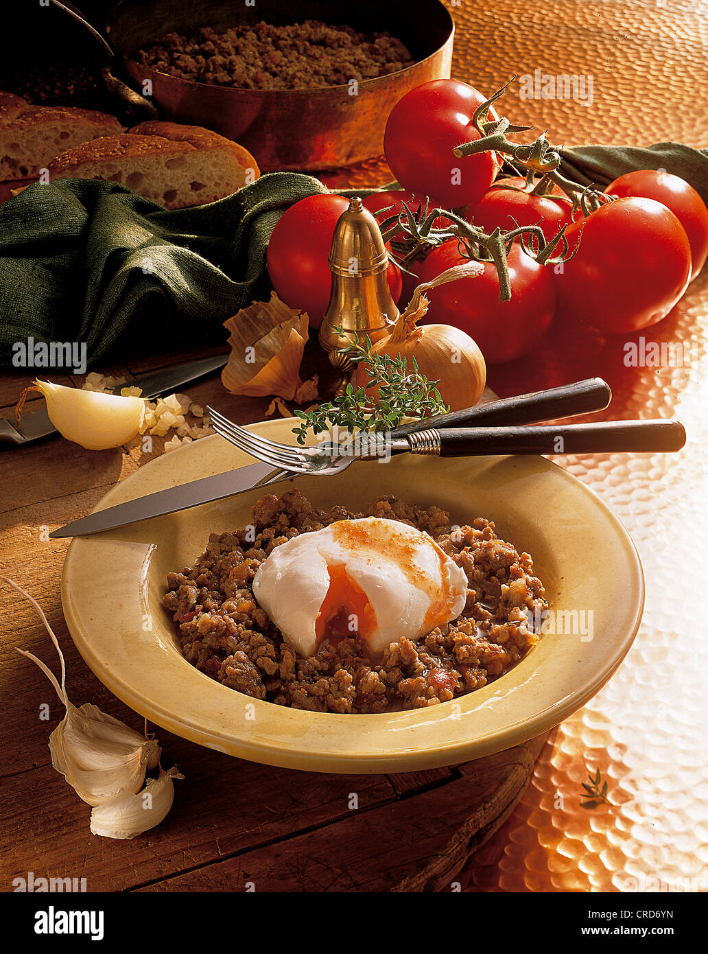 Turkish-style poached eggs on spicy minced beef, Turkey. Stock Photo