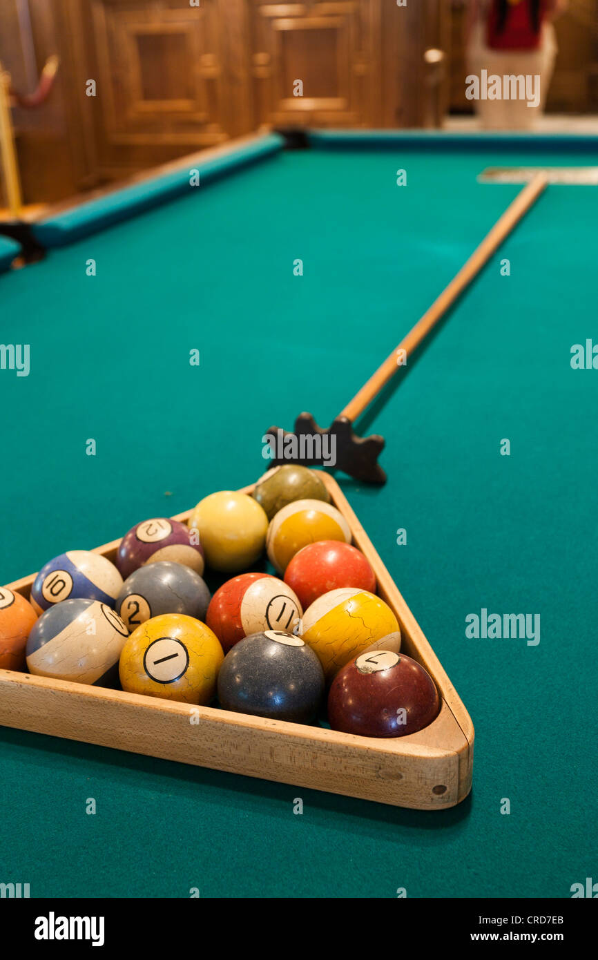 Ready to Break.  Numbered old billiard balls racked up and ready to break. Stock Photo