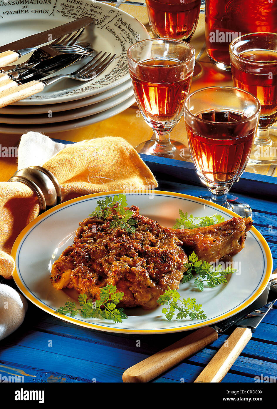 Veal chops stuffed with Roquefort cheese and parsely, crispy baked with breadcrumbs and nuts, France. Stock Photo