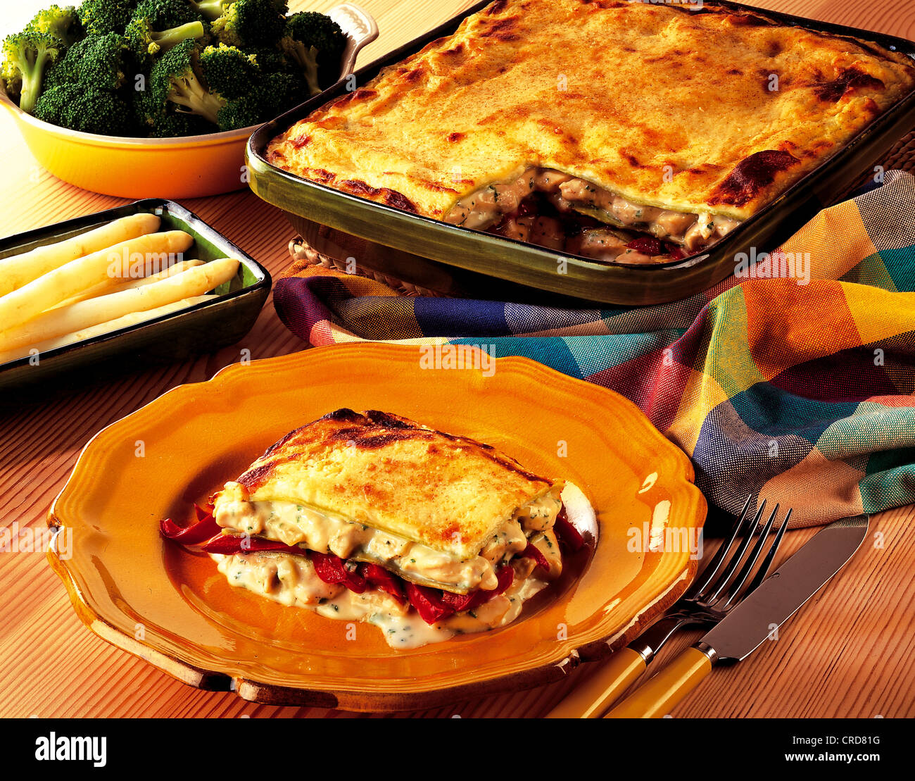 Chicken lasagna, green pasta and tender chicken with bechamel sauce and a crispy cheese crust, Italy. Stock Photo