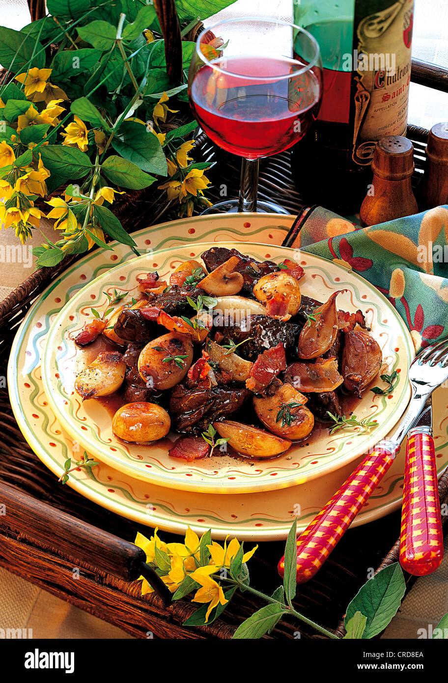 Boeuf Bourguignon, braised beef with herbs, bacon, shallots, garlic and strong Burgundy wine, France. Stock Photo
