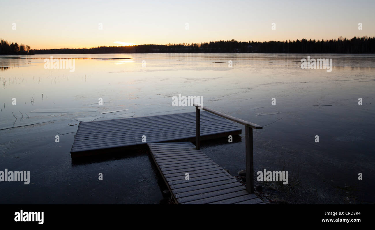 First ice on lake surface , Finland Stock Photo