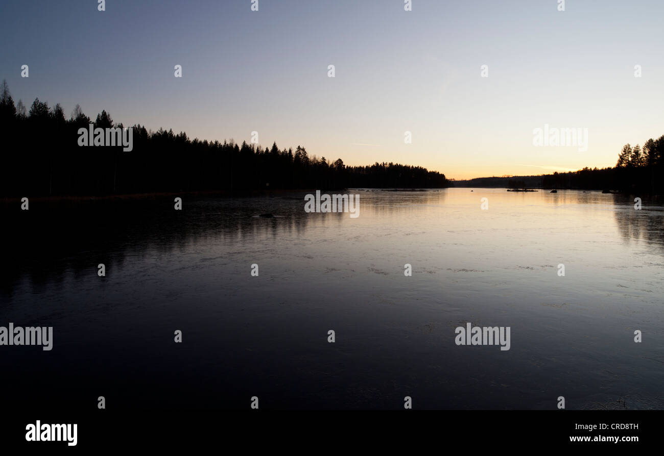 First ice on lake surface at Autumn , Finland Stock Photo