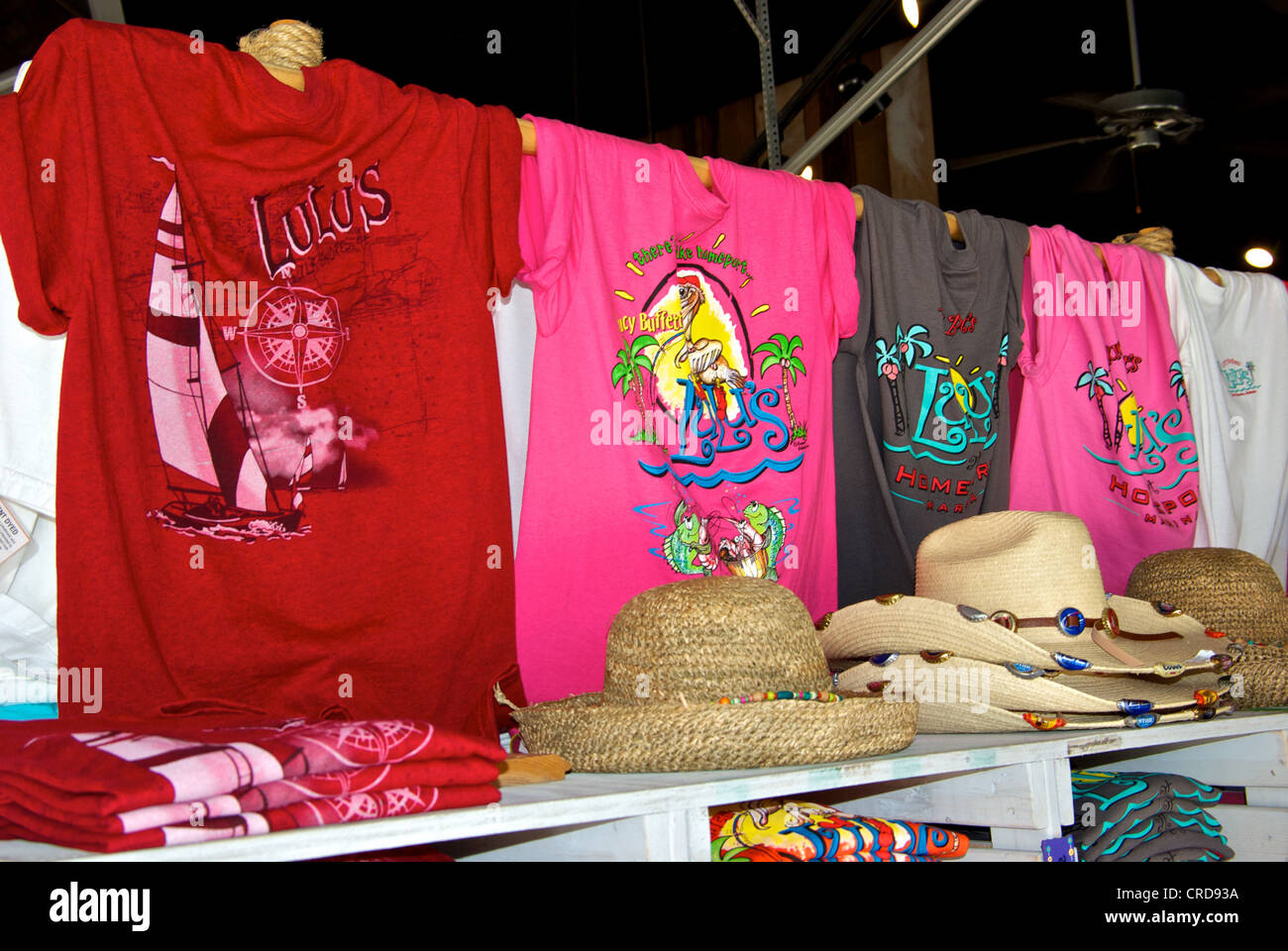 T-shirts straw hats souvenirs Lulu's restaurant gift shop Gulf Shores Alabama Stock Photo