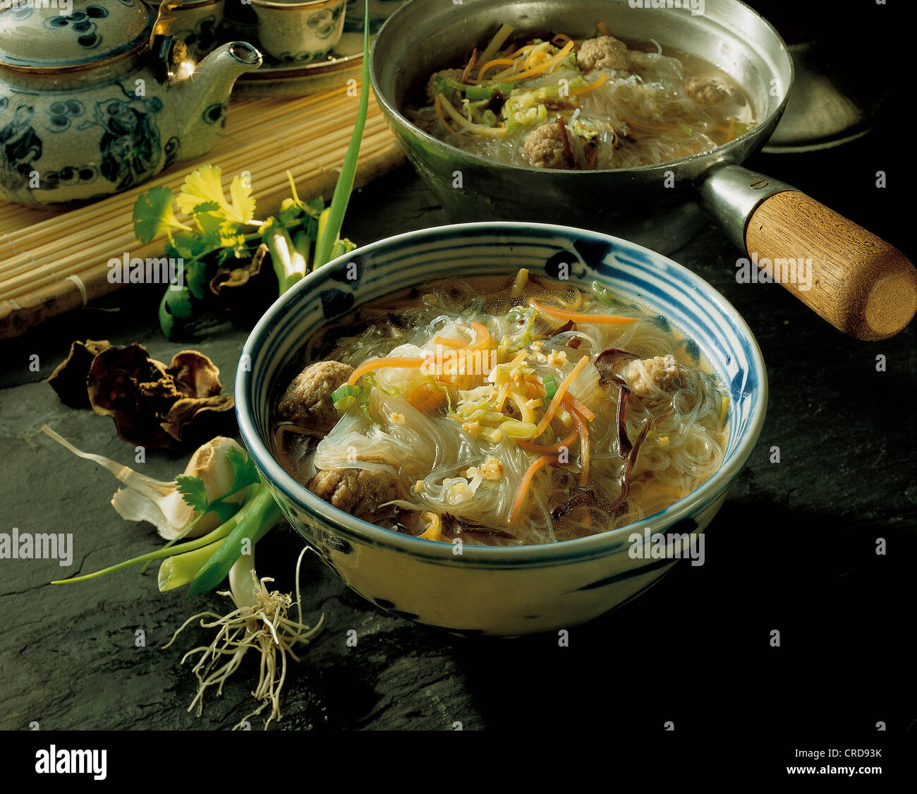 Glass noodle soup with meatballs and mixed vegetables, hearty stew, China. Stock Photo