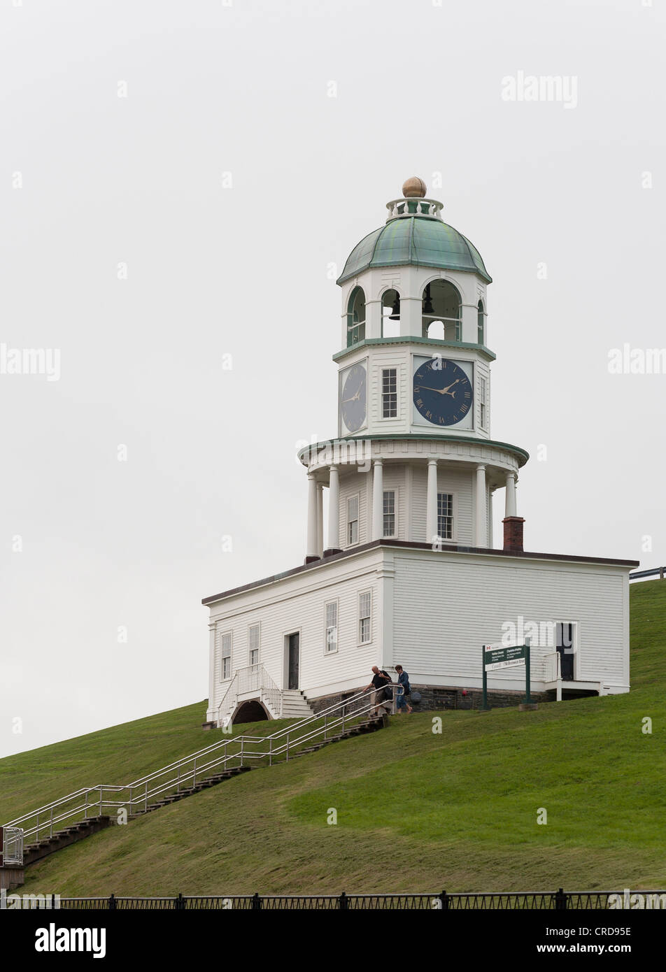 Two tourists descend the steps from the Halifax Town clock tower. Old