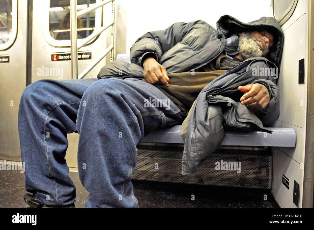 homeless sleeping in the Metro, USA, New York City, Manhattan Stock Photo