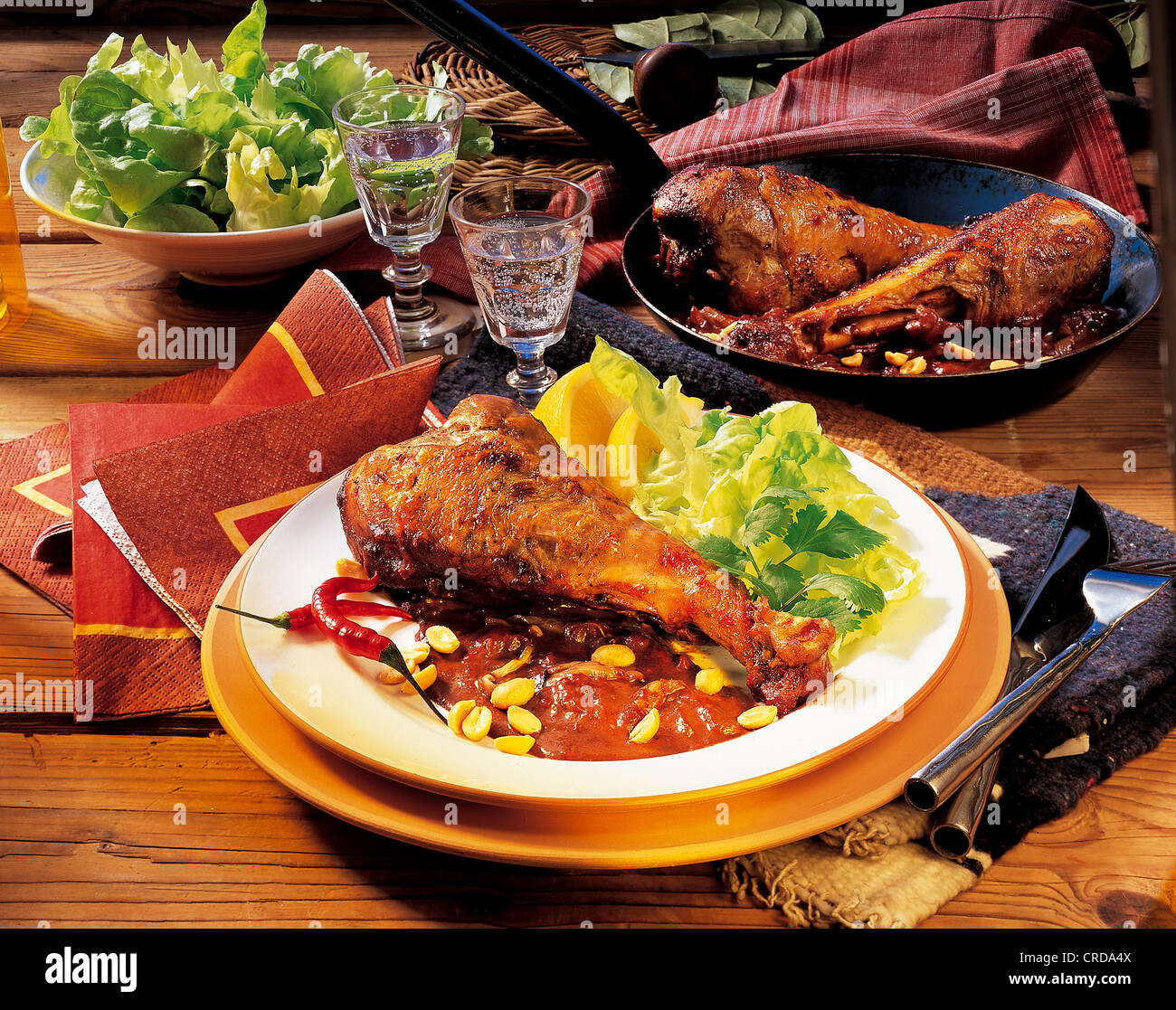 Turkey legs ina fiery sauce, Mexico. Stock Photo