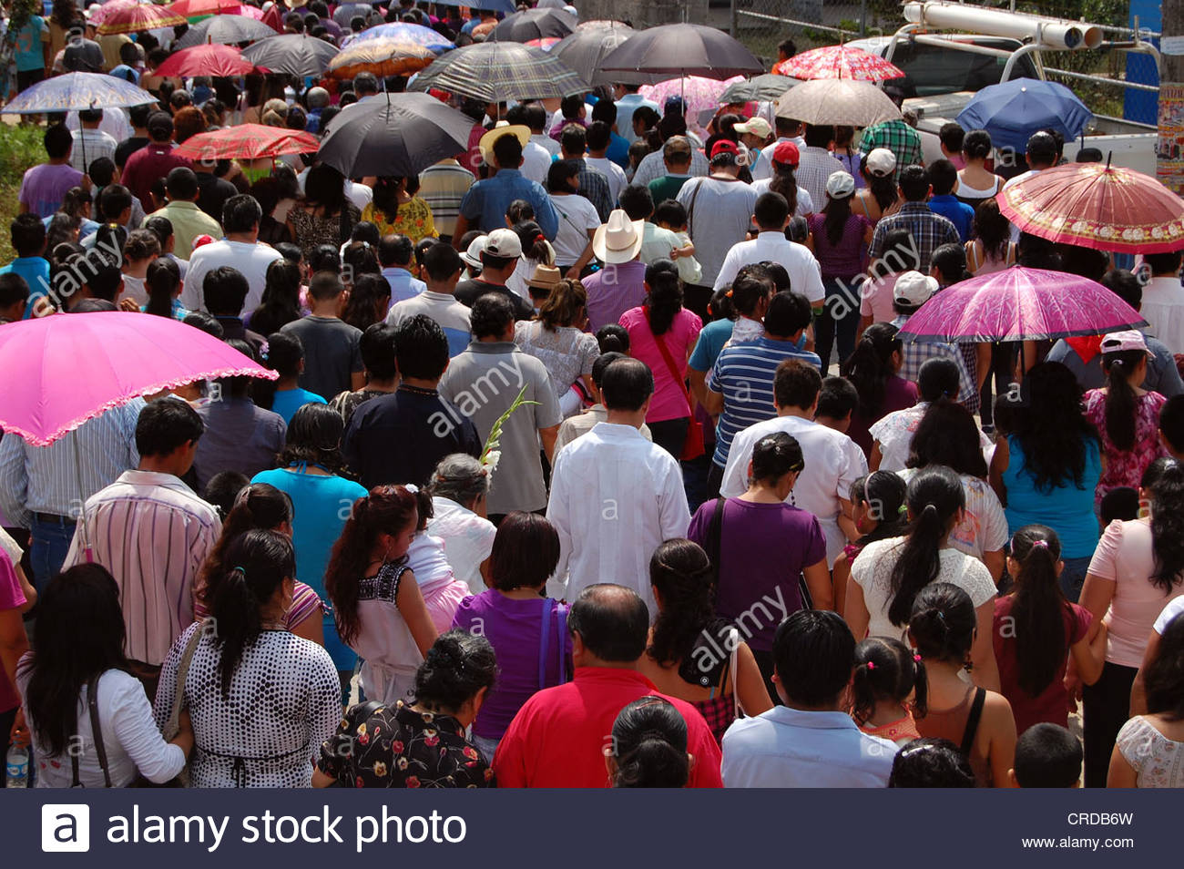 Rear view crowd of Mexican people in the Procession of Silence Stock