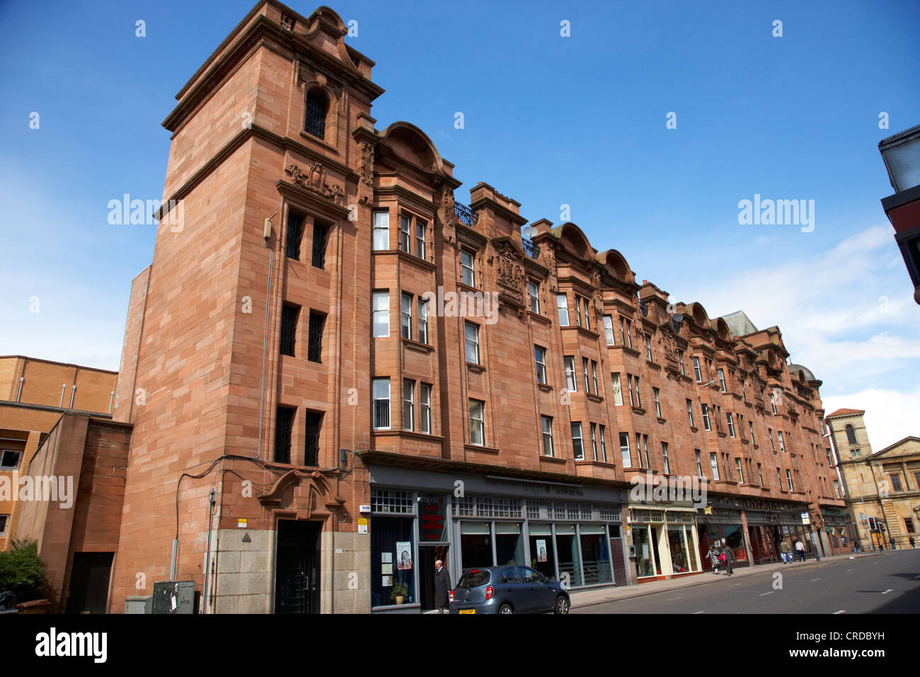 20th century mcconnels building tenement block with shops hope street glasgow scotland uk Stock