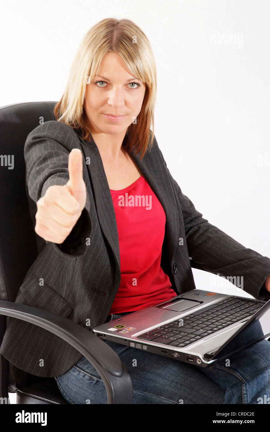 successful business woman making thumb up Stock Photo - Alamy
