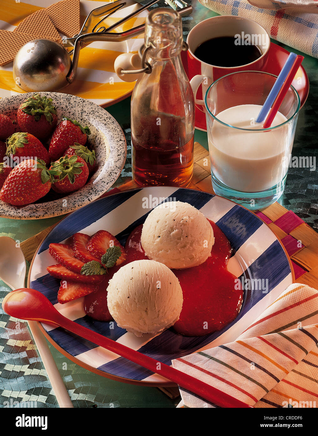 Sour cream ice cream on strawberry puree hires stock photography and