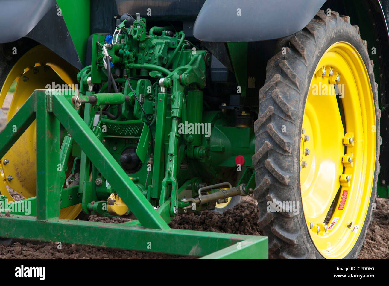 john deere tractor close up of the rear drive gear Stock Photo