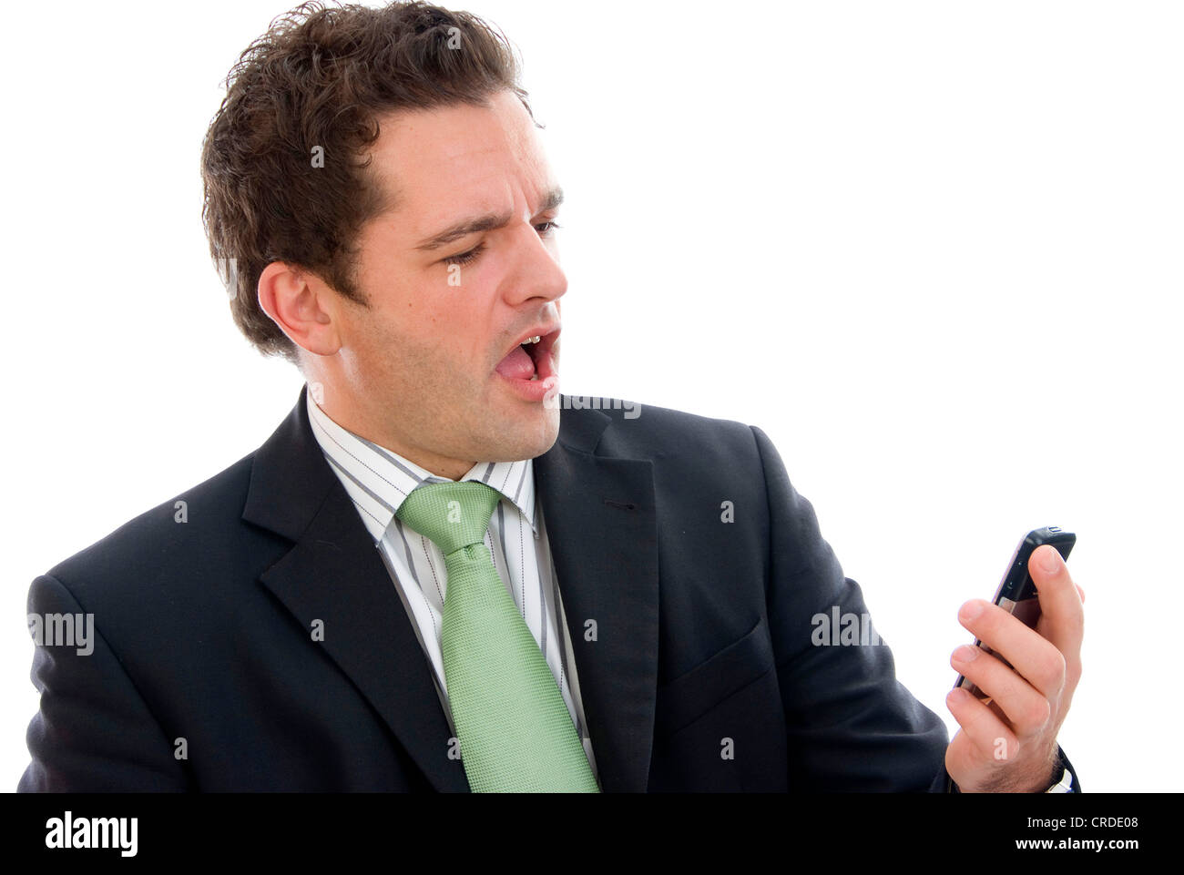 angry businessman with mobile phone Stock Photo