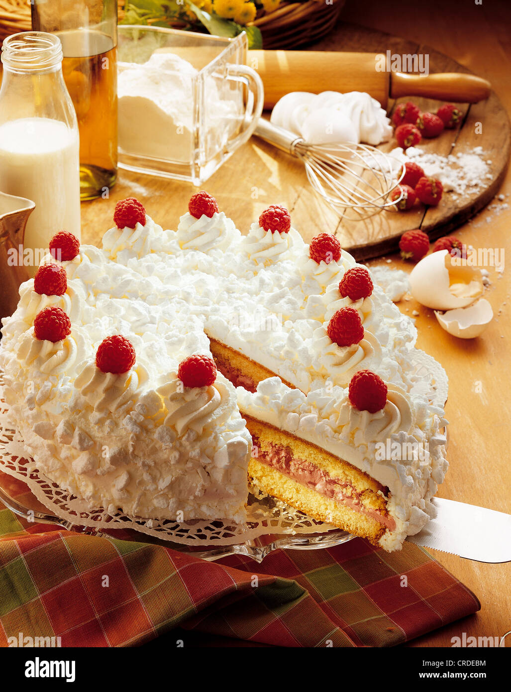 Raspberry cream cake with meringue flakes, Germany Stock Photo - Alamy