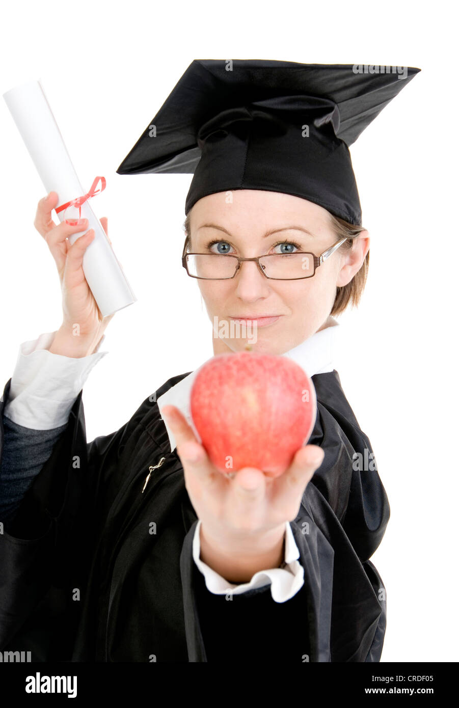 symbolic for brainfood, degree holder with apple Stock Photo