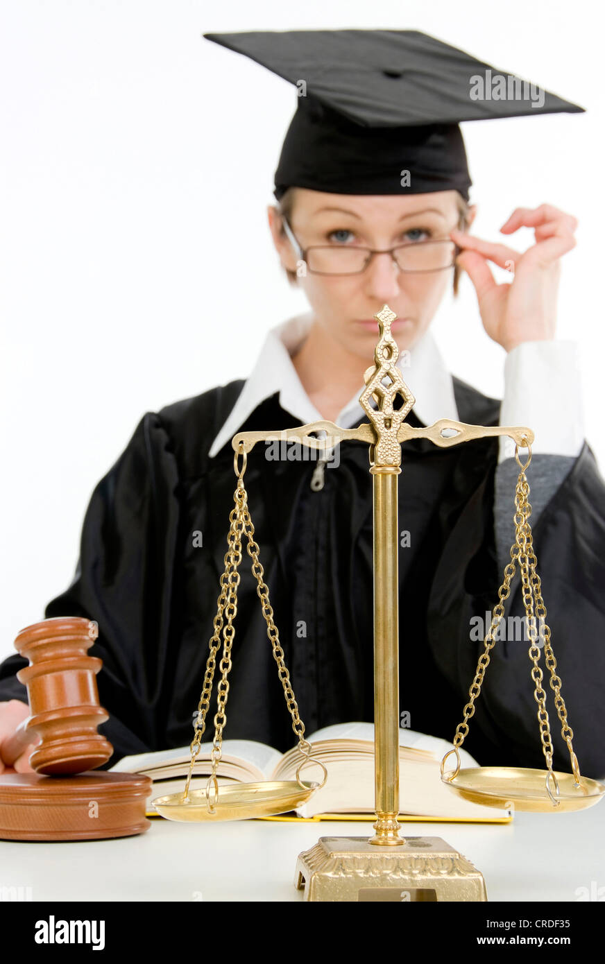 female judge with scale, code and mallet Stock Photo Alamy