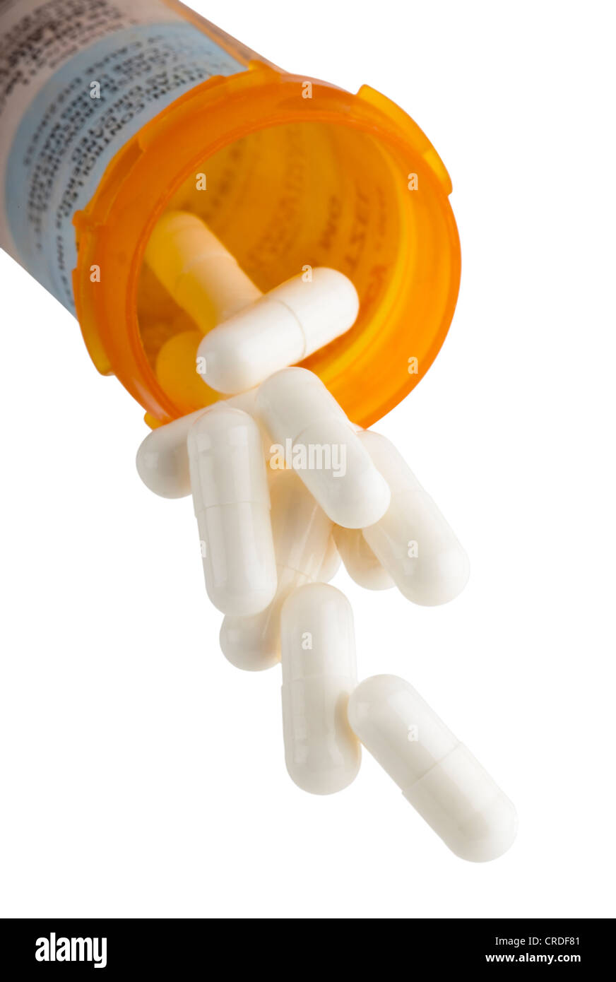 pills spilling out of prescription bottle Stock Photo