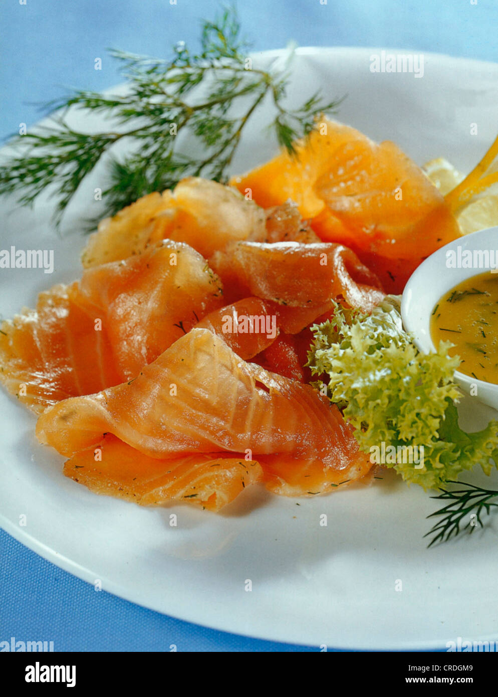 Marinated salmon with honey-mustard sauce Stock Photo - Alamy