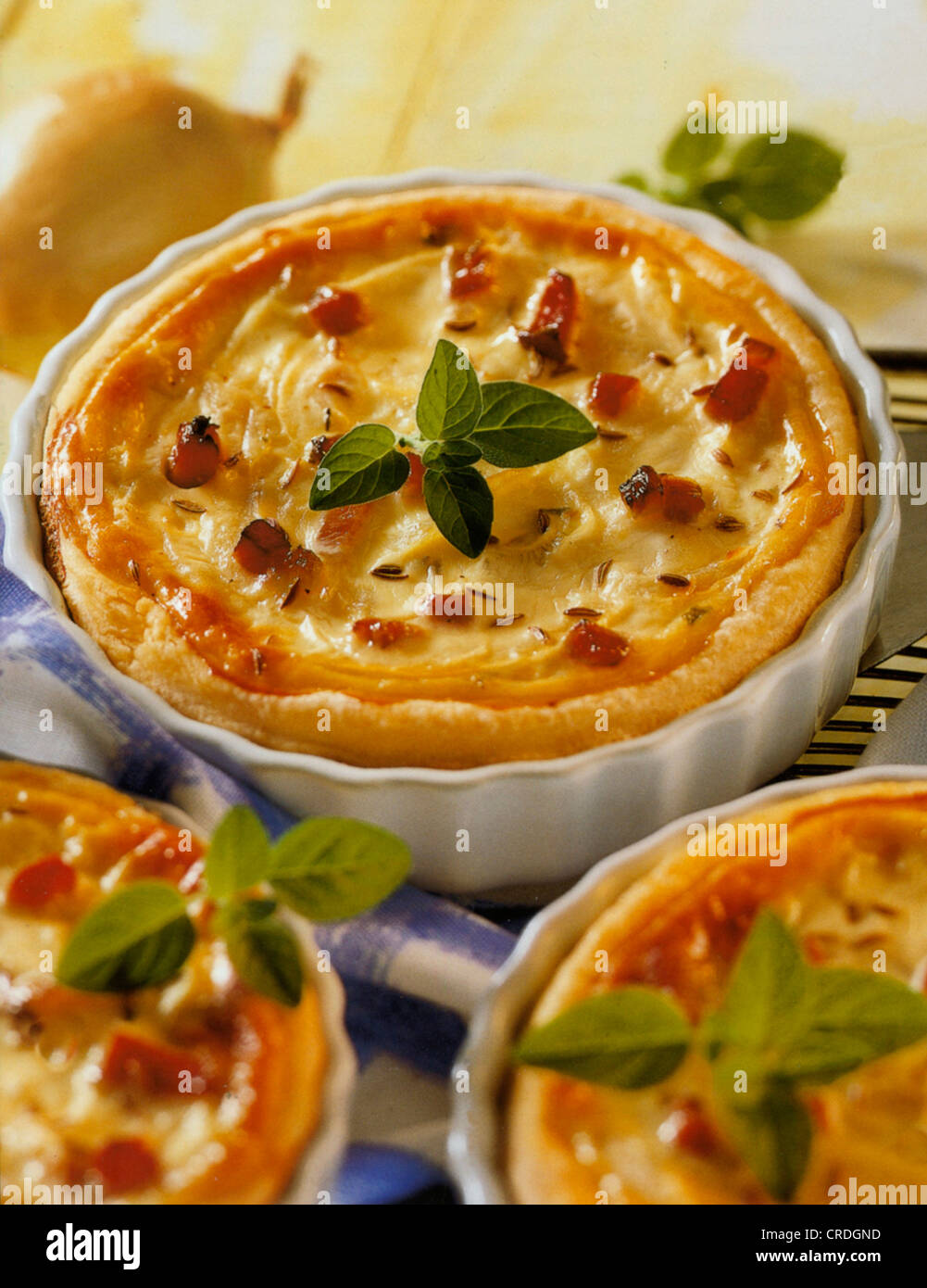 Onion quiches in ramekins Stock Photo Alamy