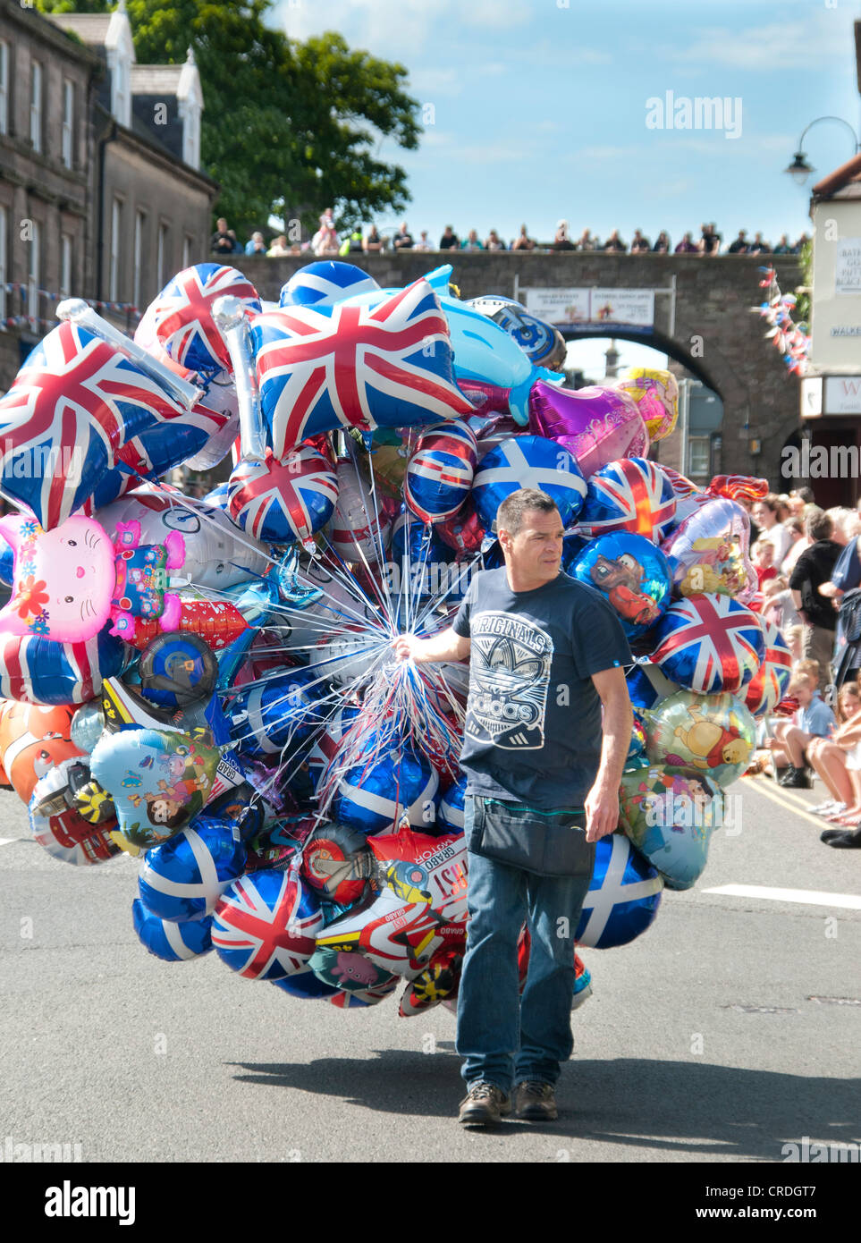 Ballon seller during the built up to the Olympic Torch Relay Berwick upon Tweed Stock Photo