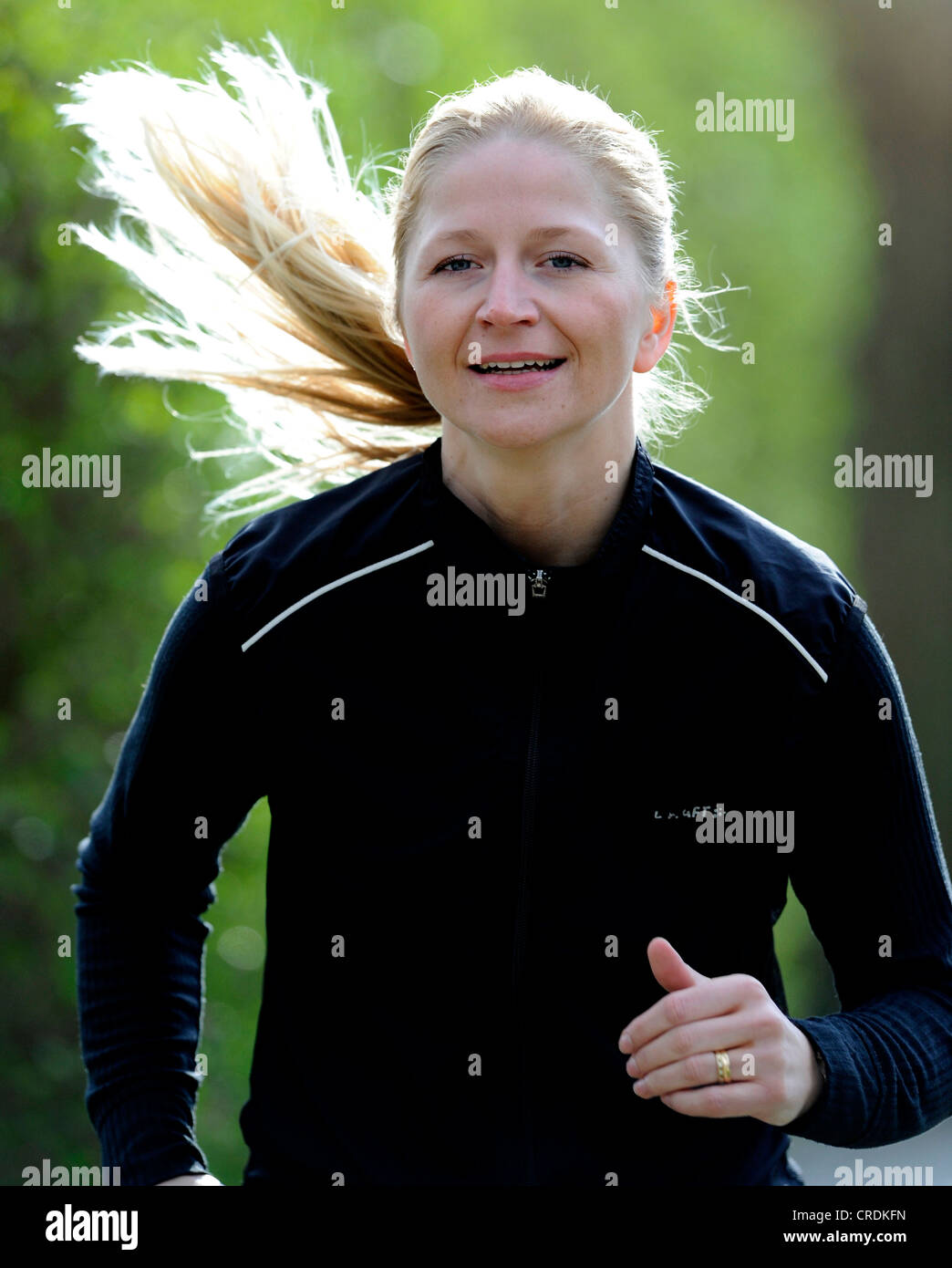 young woman at jogging Stock Photo - Alamy