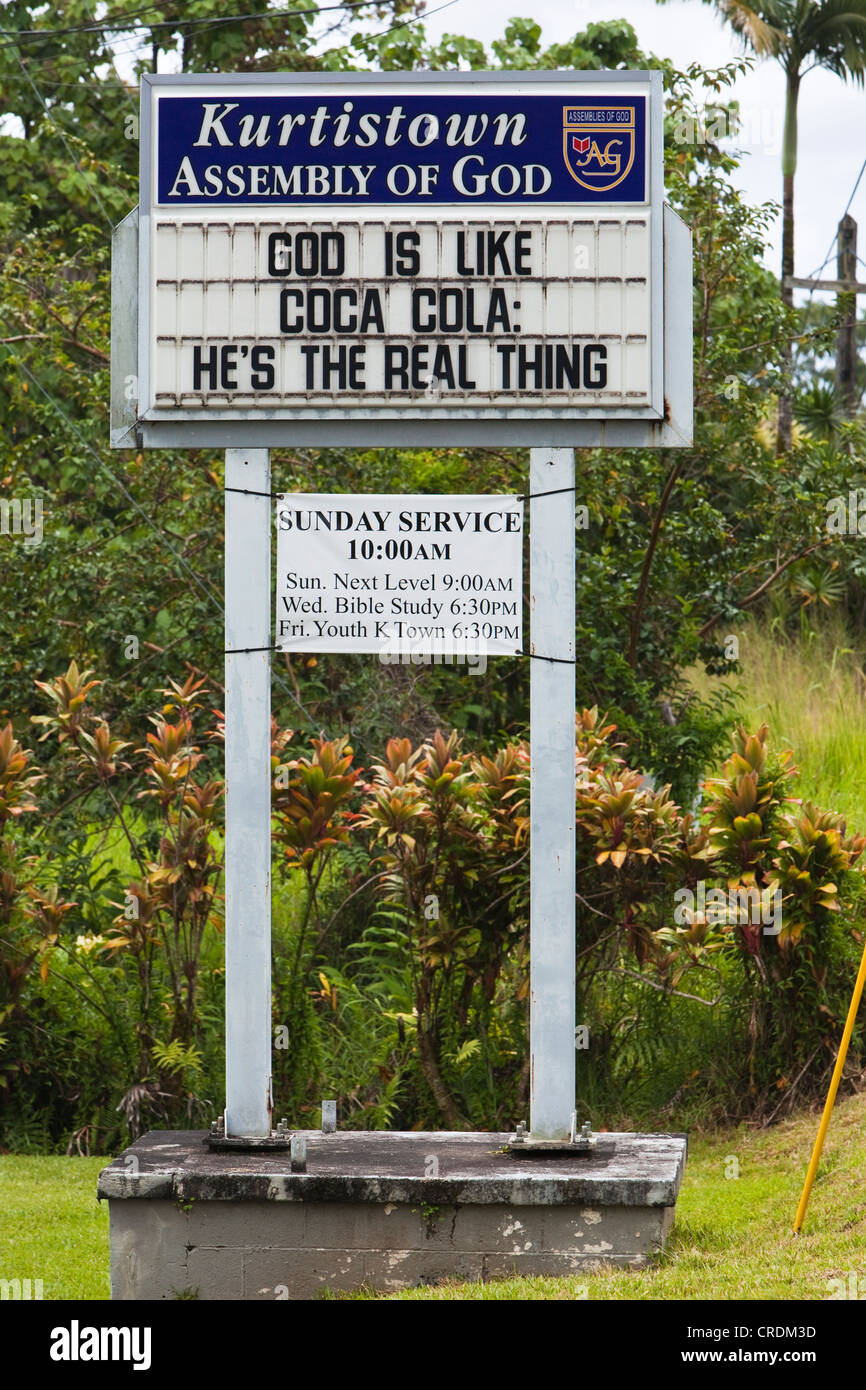 Church sign, God is like Coca Cola, He's the real thing, Kurtistown, Hawai'i, USA Stock Photo