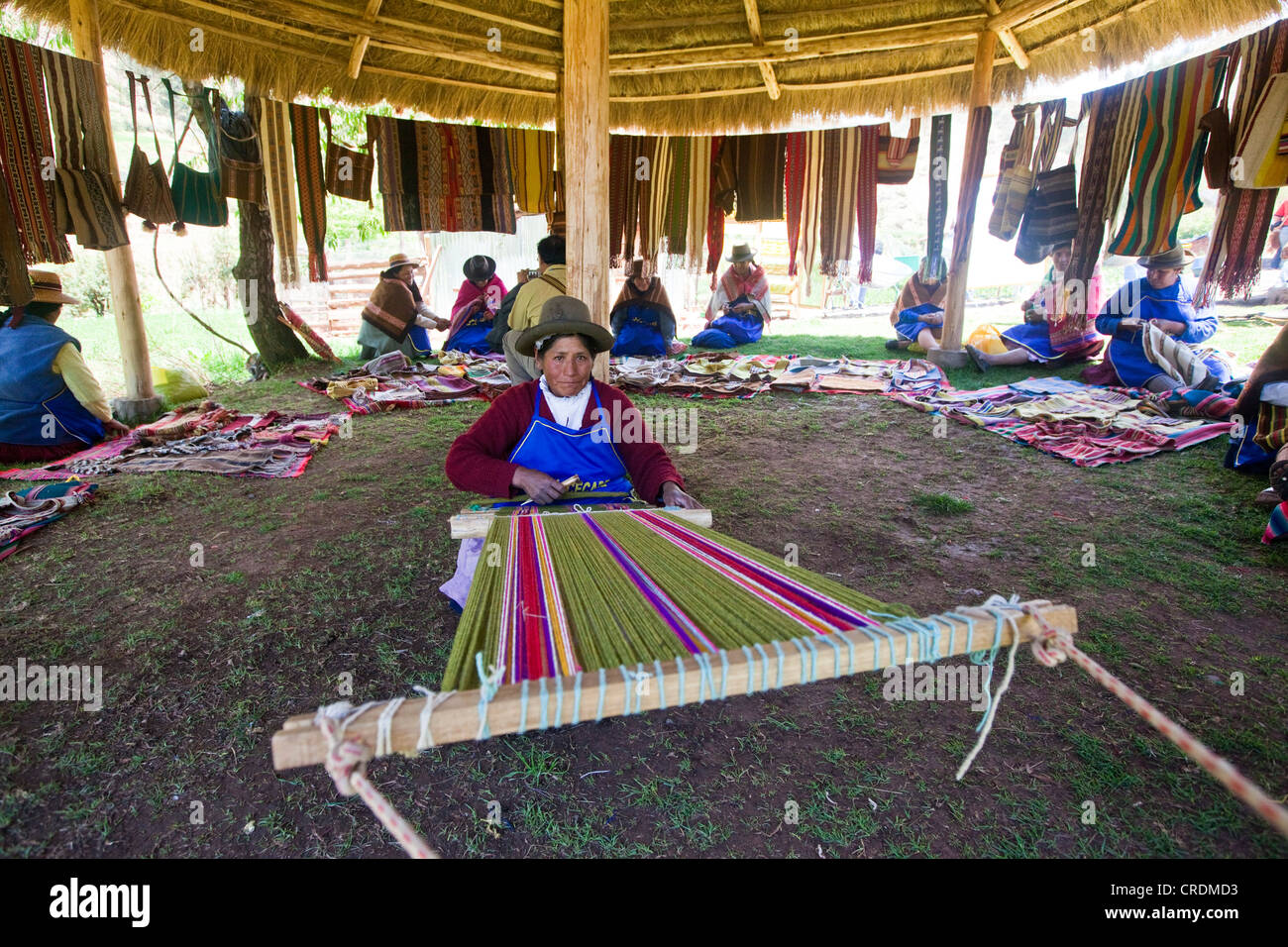 Women doing textile work, villagers are trained in renewable energy and traditional craftmanship, development project of CECADE, Stock Photo
