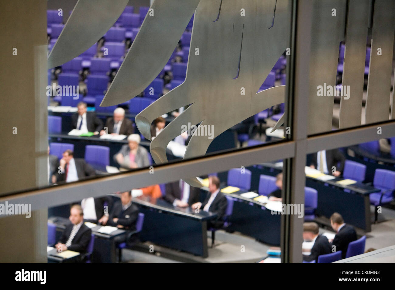 Deutscher Bundestag, German parliament, session in the plenary hall of the Reichstag building, parts of the federal eagle at Stock Photo