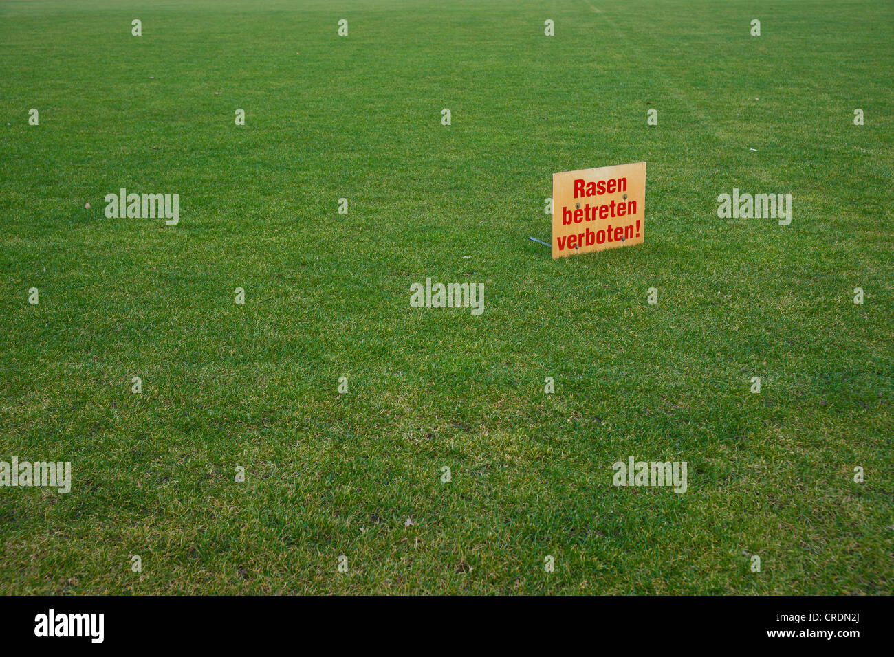 Sign in German, Rasen betreten verboten, Keep off the lawn Stock Photo
