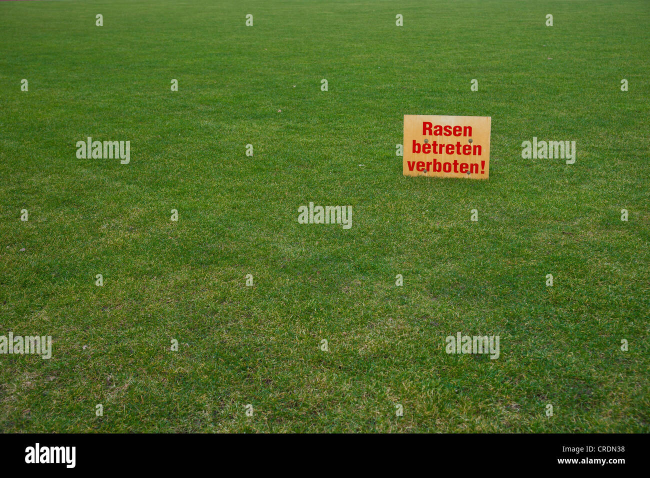 Sign in German, Rasen betreten verboten, Keep off the lawn Stock Photo