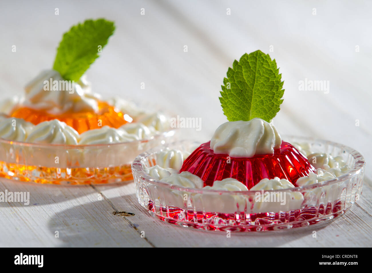 Two colored jelly with mint leaf Stock Photo Alamy