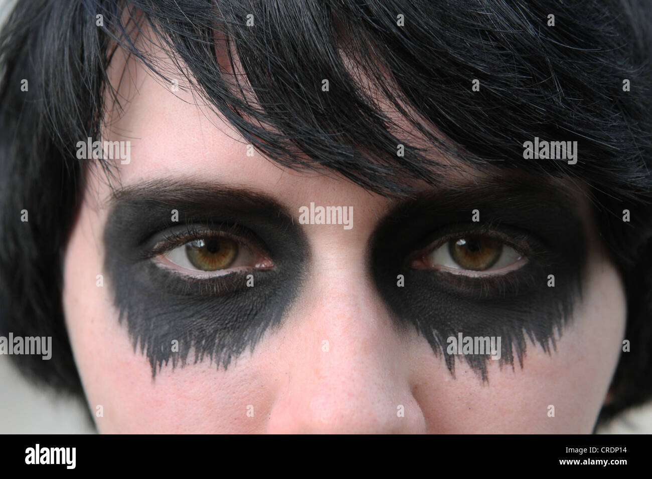 A close up of the eyes of a teen girl with goth make up Stock Photo - Alamy