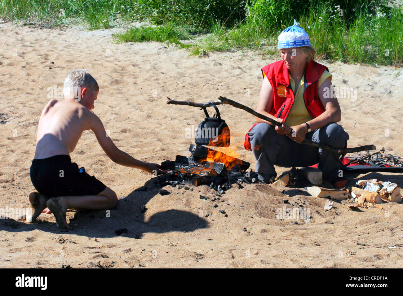 canoe trip at river Ounasjoki. Break at the campfire, Finland, Lapland