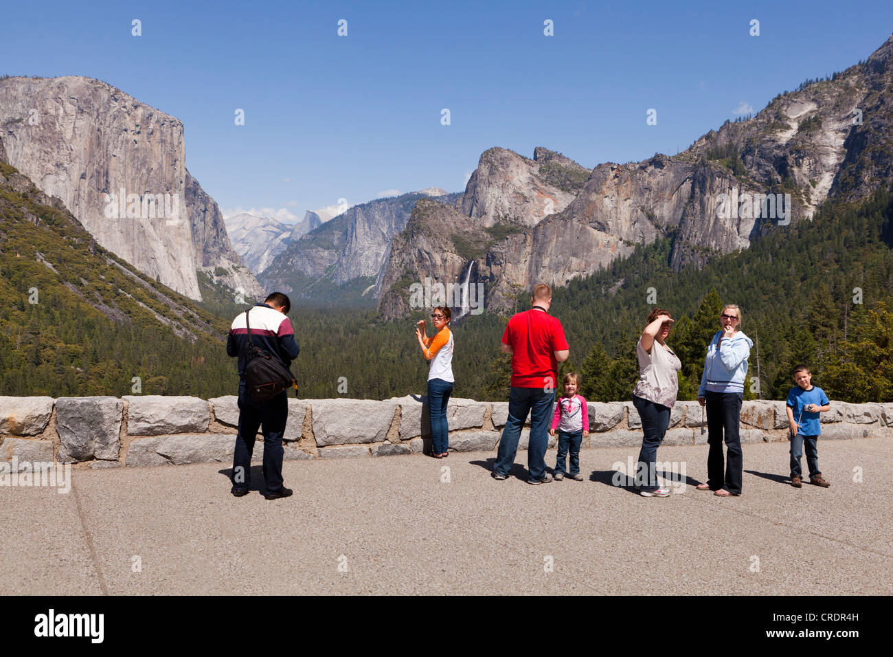 Visitors admiring Yosemite valley Stock Photo