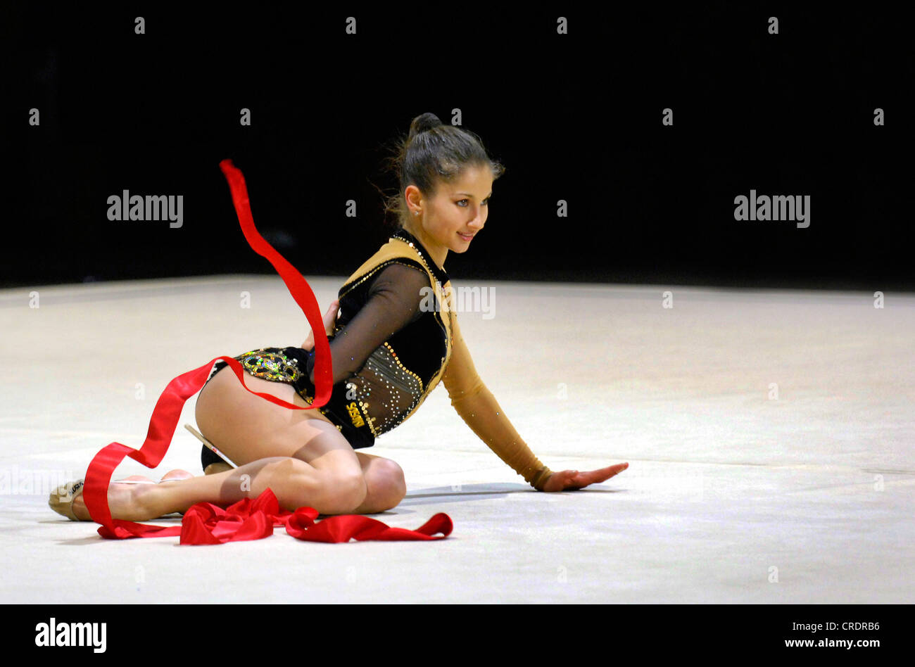 woman doing rhythmic gymnastics with ribbon Stock Photo