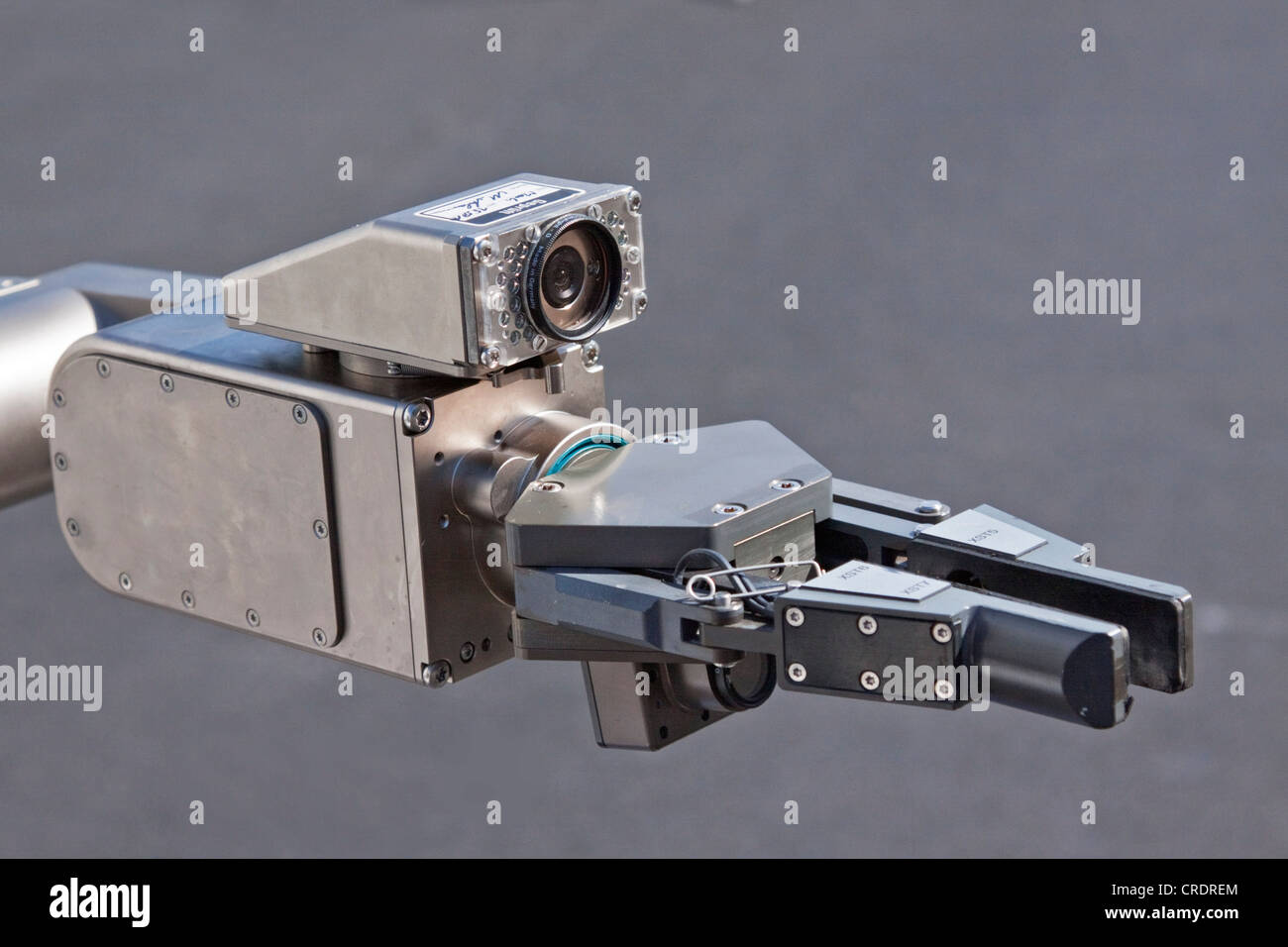 Robotic arm, claw and camera on a police robot, bomb dismantling robot, remote controlled Stock Photo