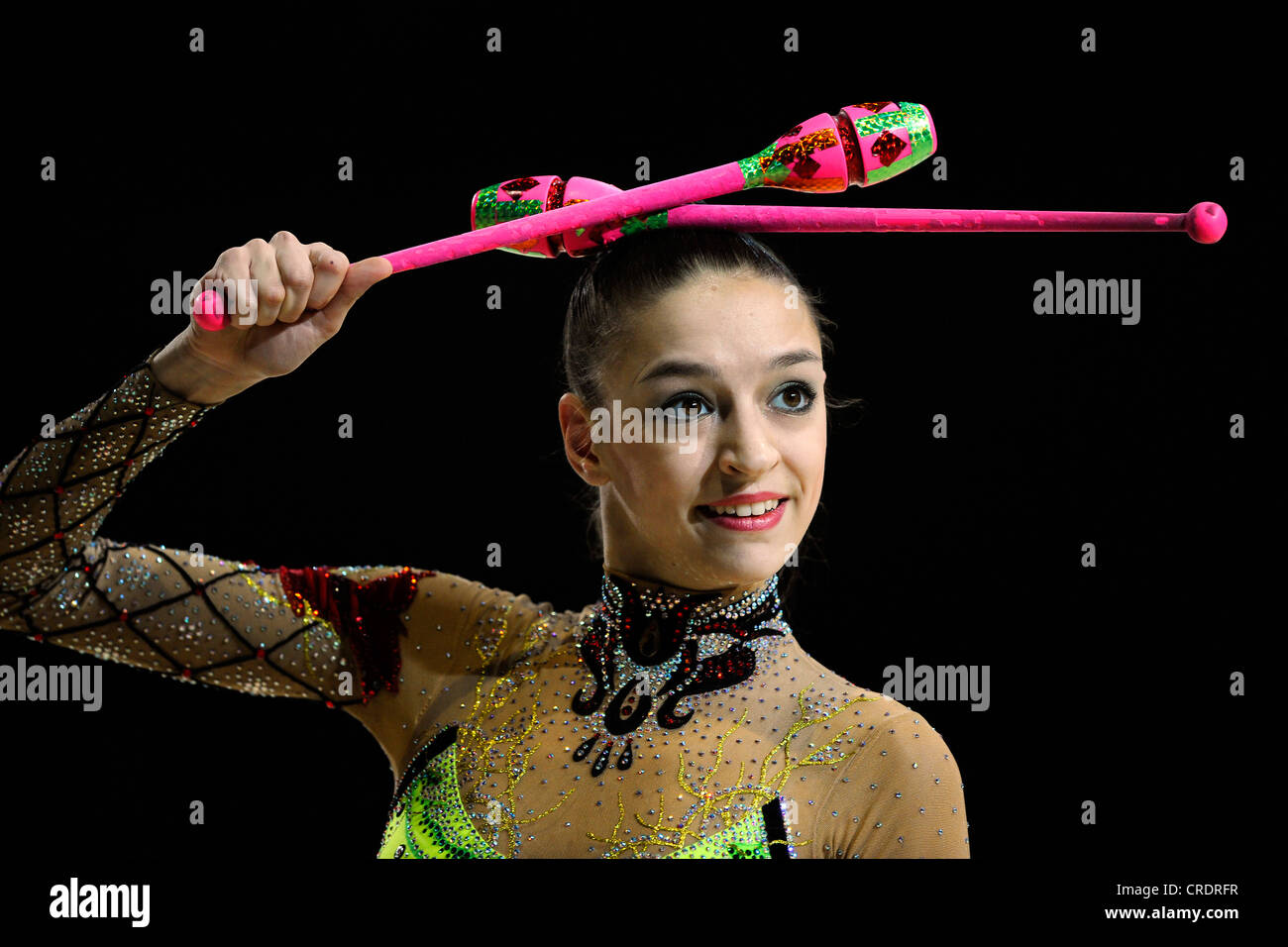 woman doing rhythmic gymnastics with claws Stock Photo