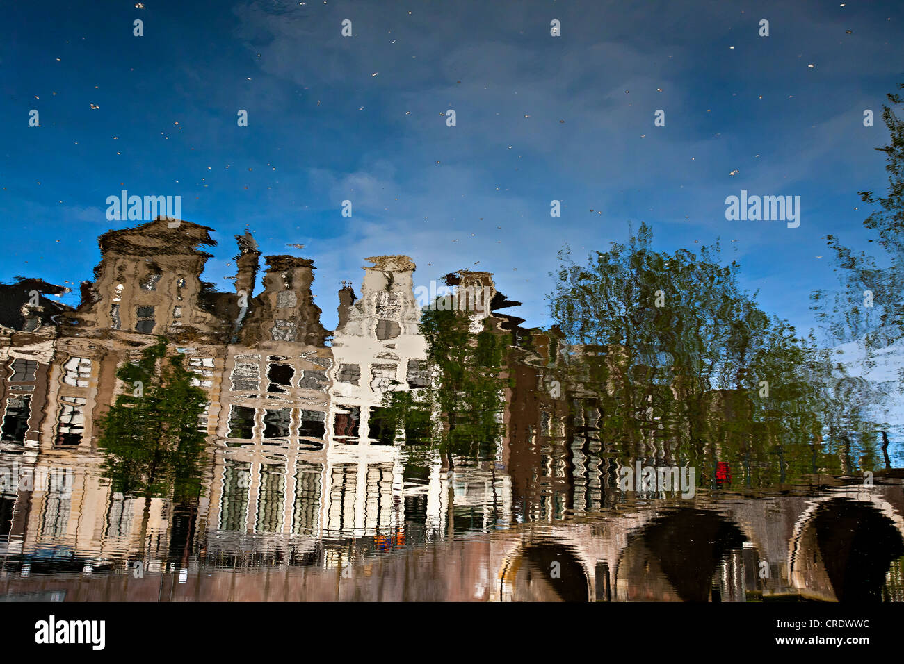 Reflection of buildings in a canal, Amsterdam, Holland, Netherlands, Europe Stock Photo