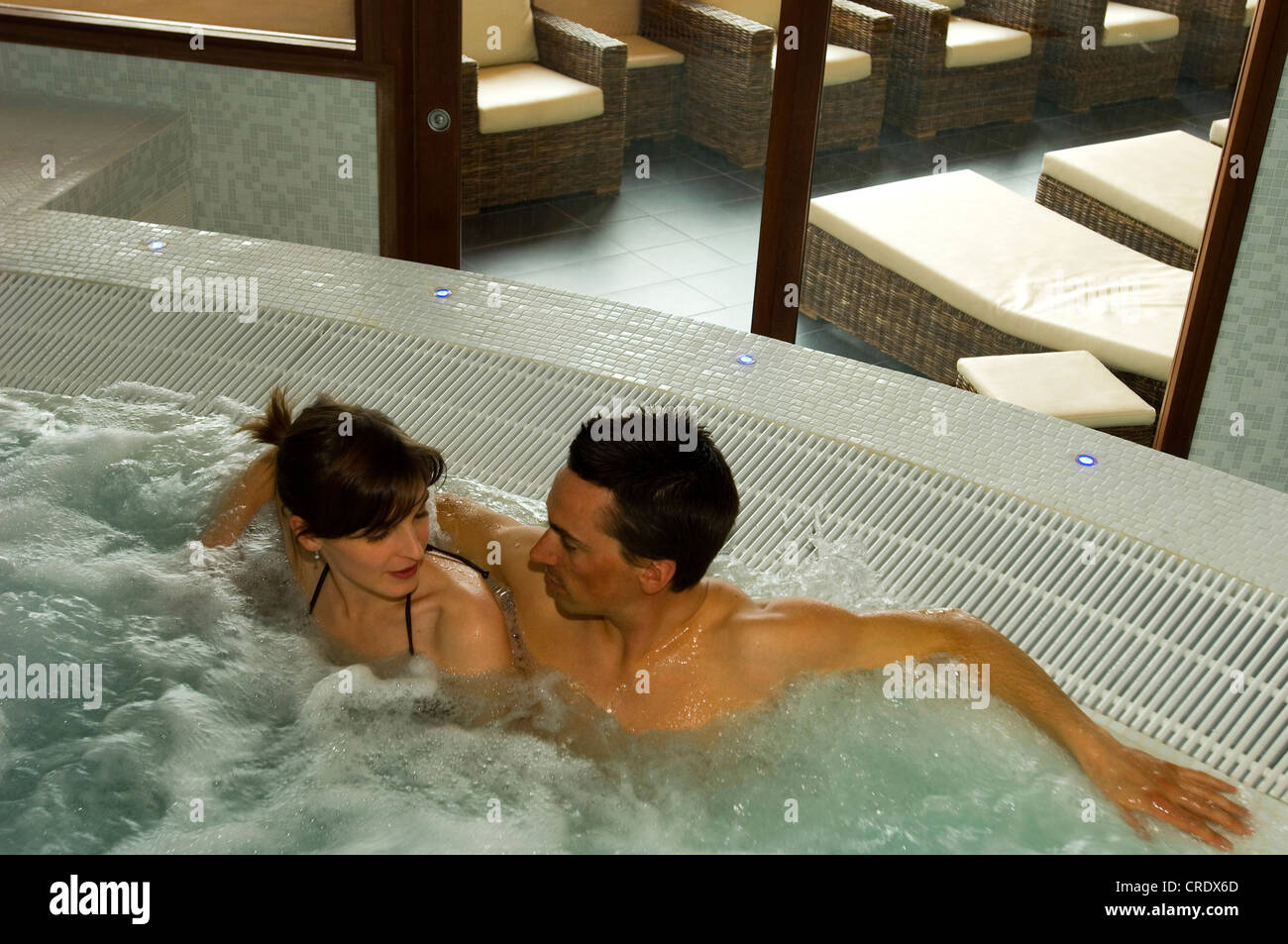 couple in a whirlpool Stock Photo