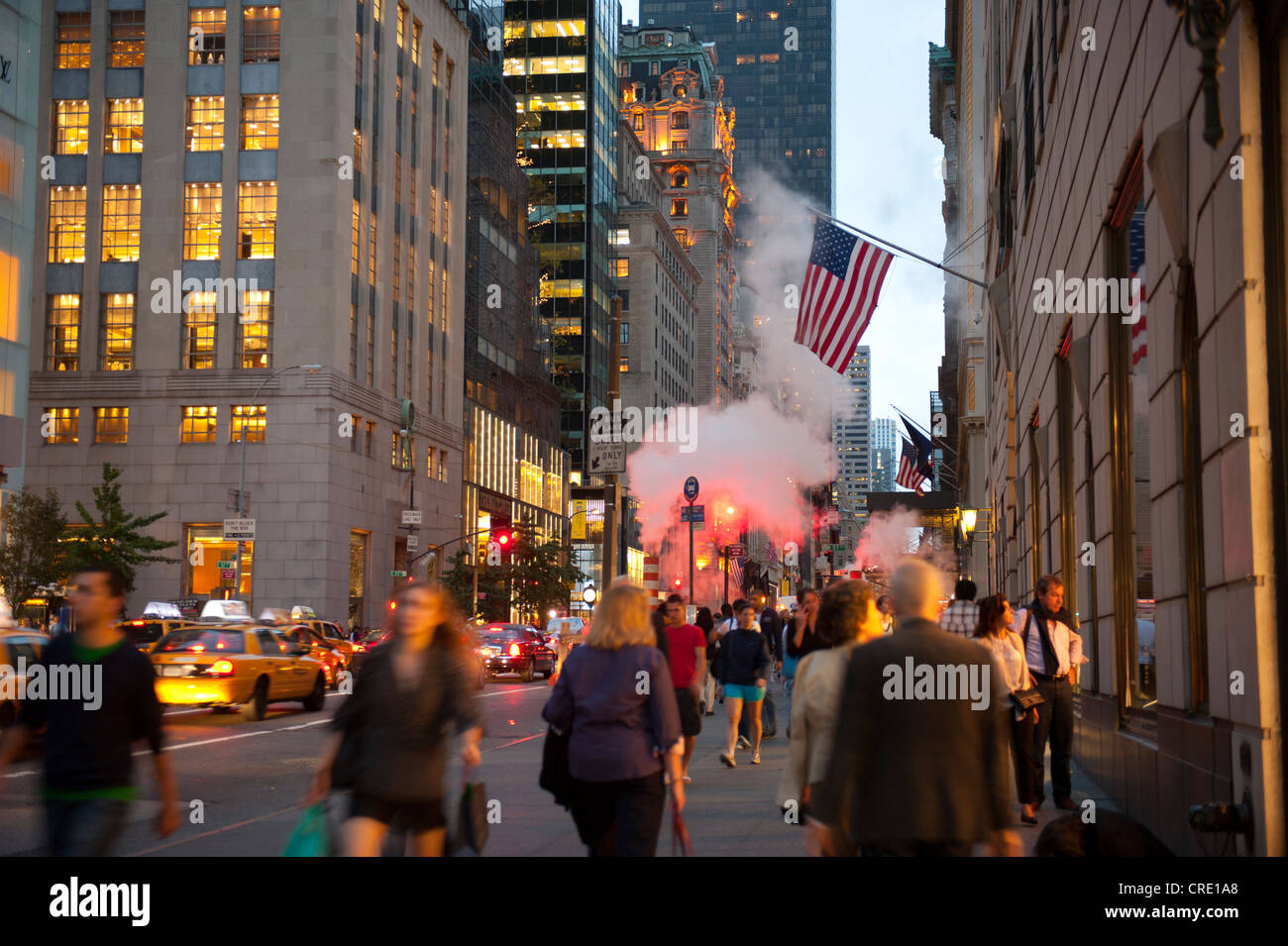 Many people on 5th Avenue close to Trump Tower in the evening, Midtown, Manhattan, New York City, USA, North America Stock Photo