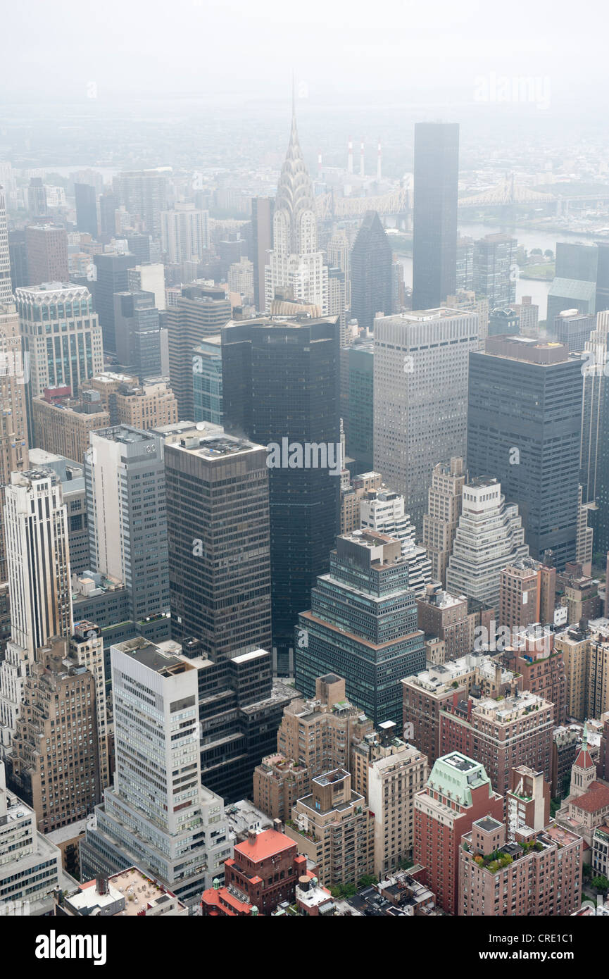 Metropolis, view from the Empire State Building to the skyscrapers of Midtown in fog, skyscrapers, Manhattan, New York City, USA Stock Photo