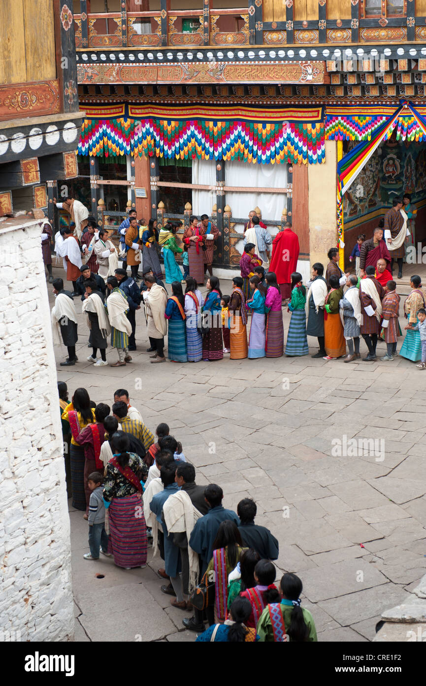 Tibetan Buddhist festival, people wearing the traditional Gho robe