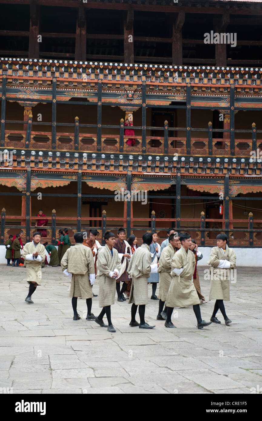Tibetan Buddhist festival, men wearing the traditional Gho robe