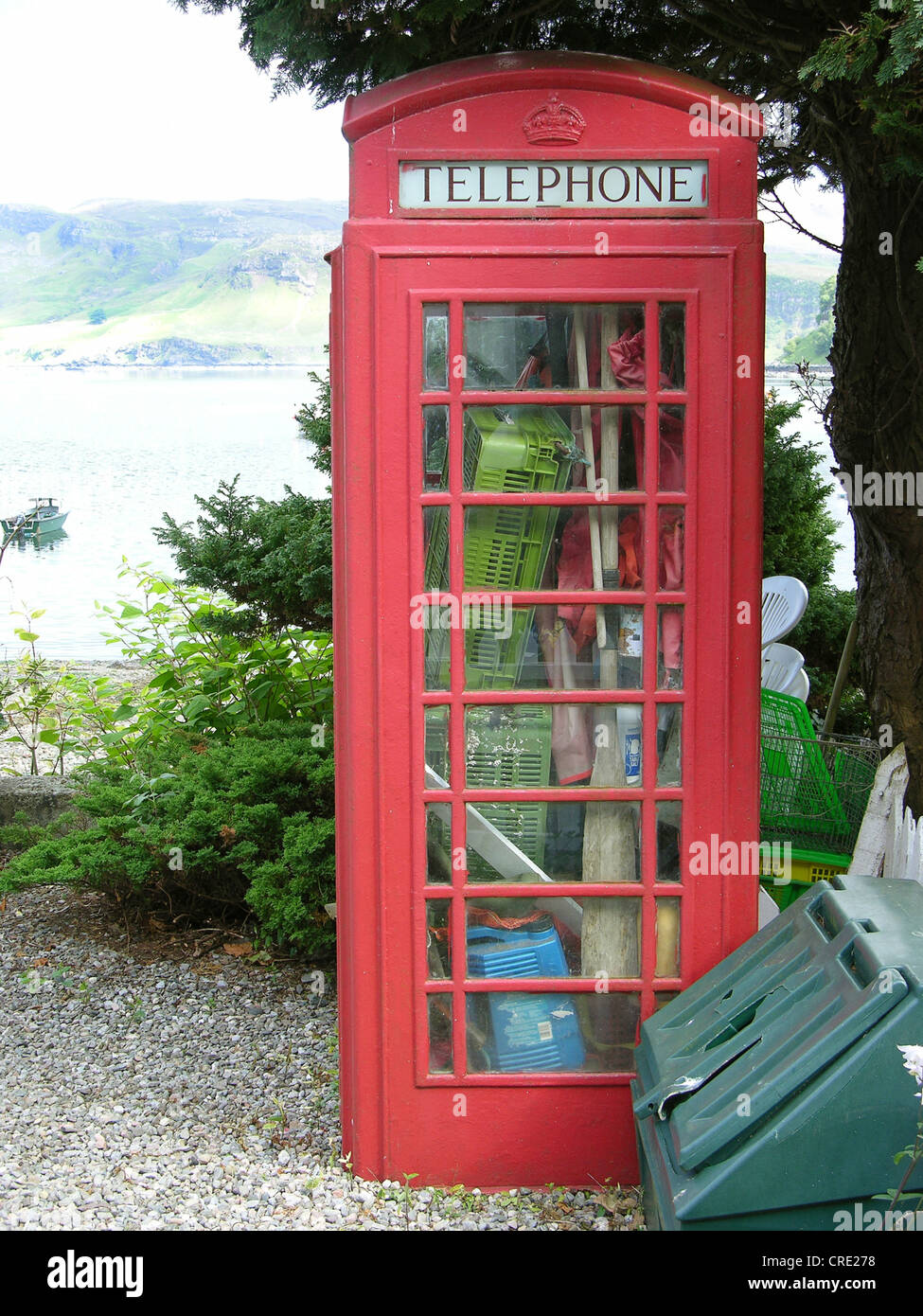 phonebox used for garten tools, United Kingdom, Scotland, Isle Of Skye, Portree Stock Photo