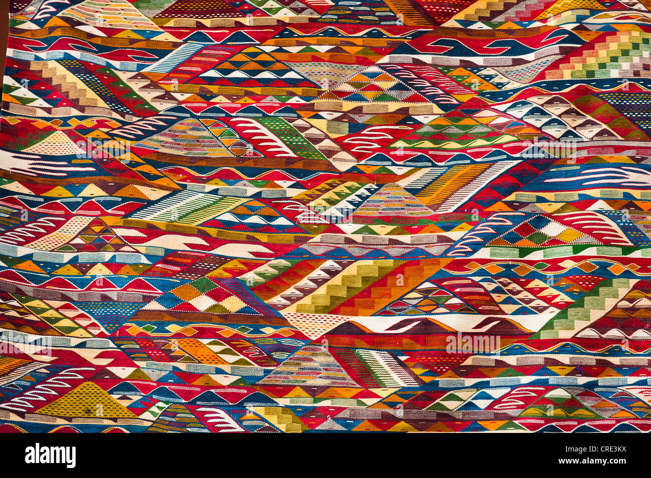 Multi-coloured pattern of a woven carpet, Marrakech, Morocco, Africa Stock Photo